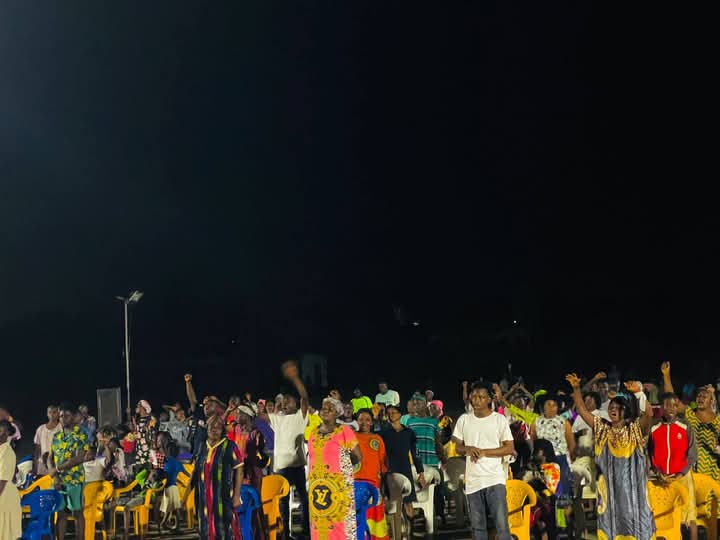 People gathered outdoors for a gospel event